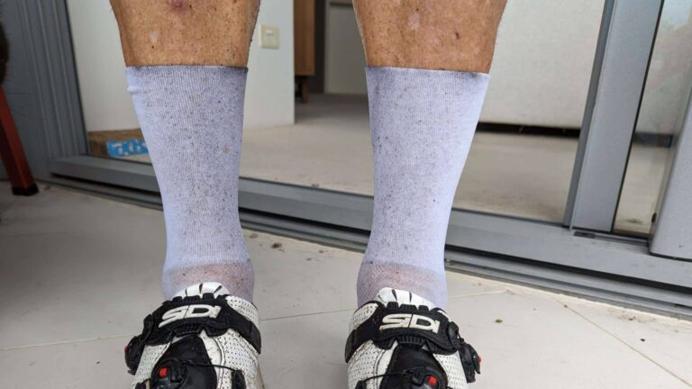 White cycling socks after riding in the rain