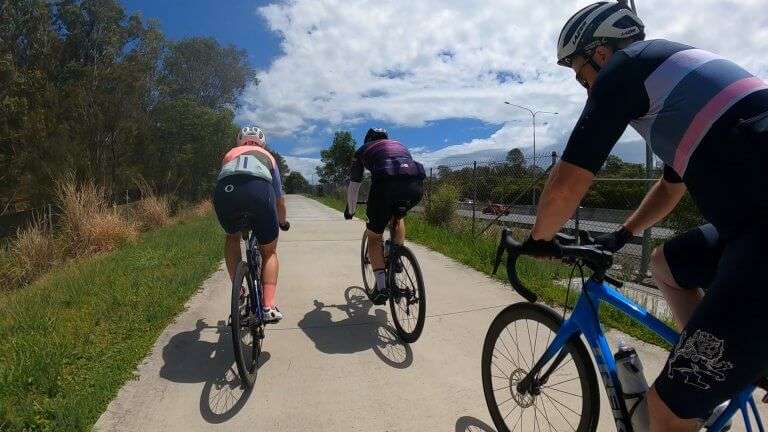 cyclists riding
